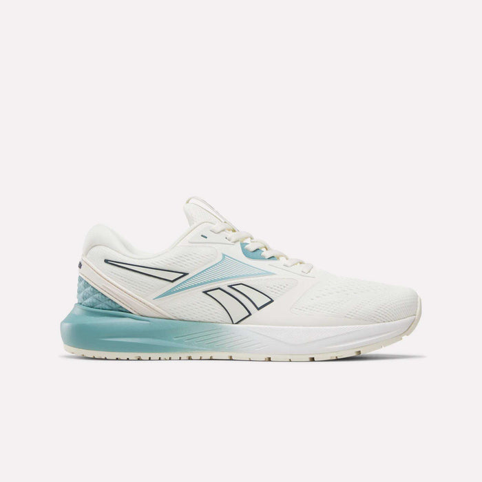 The Reebok Women's Nanoflex 2.0 Training Shoes are showcased in a side profile against a plain white background, featuring a mesh upper in Chalk with Hazy Teal and Midnight Tide accents, a black-outlined logo, and a cushioned sole—making them an ideal choice for women's workout or training sessions.