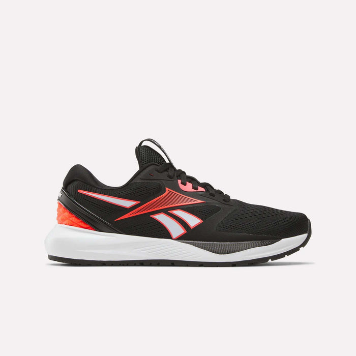 The Reebok Women's Nanoflex 2.0 Training Shoes in black with white and bright red accents feature a mesh upper, lace-up design, and red heel detail—ideal for workouts. Shown on a plain white background.