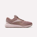 The Women's Nanoflex 2.0 Training Shoes by Reebok feature mauve pink mesh, a reinforced heel, white and gold Reebok logo, cushioned sole, and lace-up closure—perfect stylish workout shoes for women. Shown on a plain white background.