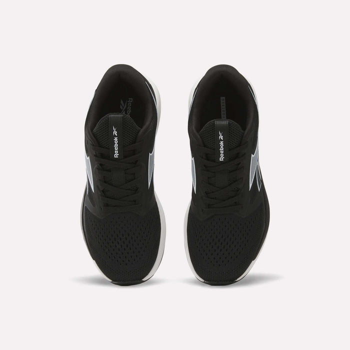 A pair of Women’s NFX Trainer 2 Training Shoes by Reebok in black, viewed from above, featuring mesh uppers, white soles, and Reebok logos on the tongues and sides. The training shoes are placed side by side on a plain white background.
