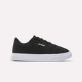 The Reebok Women's OnLux Court Lite Walking Shoes feature a black design with black laces and a white rubber sole, displayed in side profile on a light background—ideal for comfortable all-day walking.