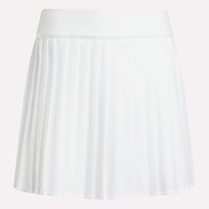 The Reebok Women's Pleated Skort is a white mini skort with a wide waistband, made from UPF-rated RBK-DRY fabric, shown against a plain background.