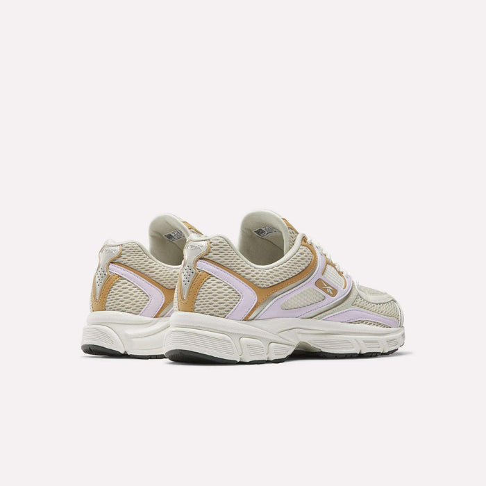 Women's Premier Trinity Shoes by Reebok in beige, white, and tan mesh and synthetic materials with retro tech details, displayed from back and side angles on a plain white background.