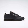 A pair of black Reebok Women's Princess Shoes featuring a classic low design, lace-up closure, heritage accents, and the Reebok logo with Union Jack on the side, displayed against a plain white background.