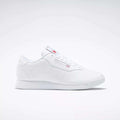 The Reebok Women's Princess Wide Shoes are classic white low-top sneakers for women, featuring subtle Reebok branding and the Union Jack logo on the side and tongue, shown against a plain light background.