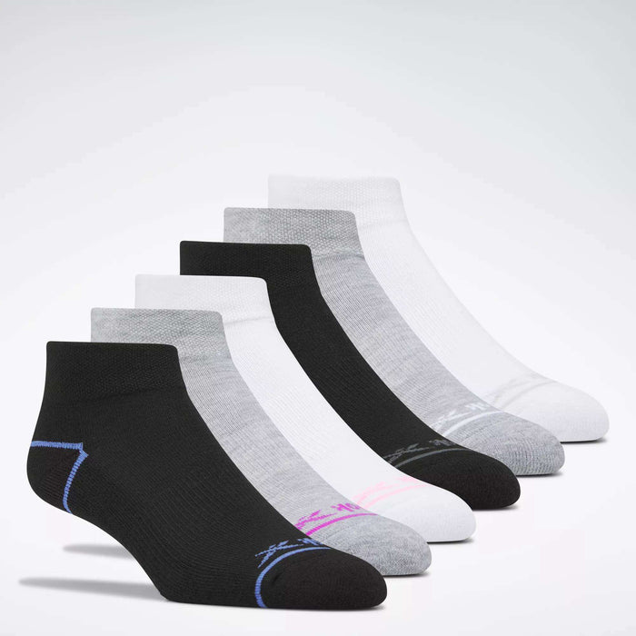 Six pairs of Women's Reebok Basic Quarter Socks are displayed side by side in black, gray, and white with colored accents, shown on a plain white background.