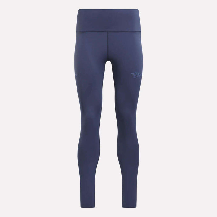 The Women's Reebok x F45 Training Leggings by Reebok are navy blue, high-waisted athletic leggings with a supportive high-rise waistband and a seamless design. They feature visible stitching and a small F45 logo on the left thigh, and are displayed against a plain light background.