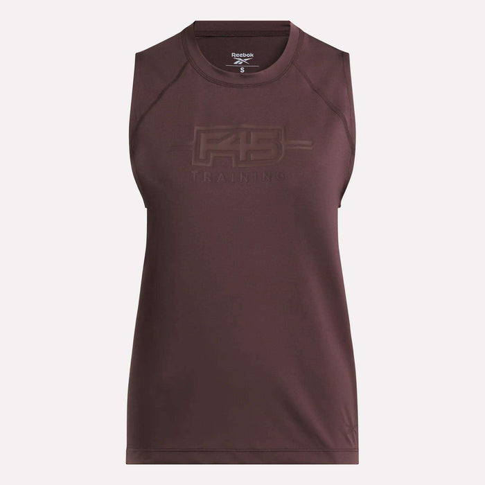 Introducing the Women's Reebok x F45 Training Tank Top—a sleeveless maroon athletic piece featuring "F45 TRAINING" embossed on the front chest. Crafted from premium, sweat-wicking materials, this tank top keeps you cool and comfortable throughout your workouts. The simple, fitted design is complemented by a Reebok logo on the inside neck label, showcasing authentic Reebok performance.