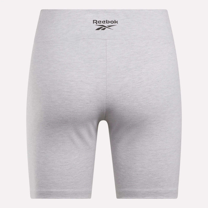 Back view of Women's Small Logo Cycle Shorts by Reebok in light gray, featuring a black logo on the waistband. These cotton-rich shorts offer a snug, stretchy fit with no visible seams or pockets for a sleek, comfortable look.