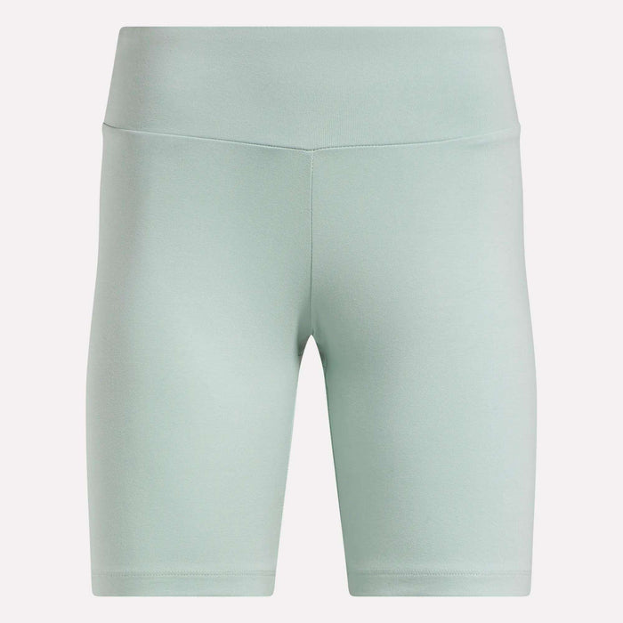 Reebok Women's Small Logo Cycle Shorts in light green feature a high-waist, smooth cotton finish, front seam detailing, and fitted knee-length stretchy design, shown against a plain white background.