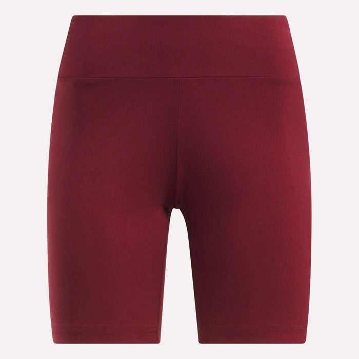A pair of Reebok Women's Small Logo Cycle Shorts in red, shown on a white background.