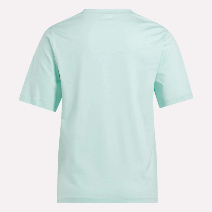 The Reebok Women's Two-Color Logo Crew Short Sleeve Tee, shown from the back in light blue against a white background.