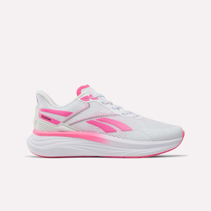 The Reebok Women’s Viva Speed Shoes are white athletic sneakers with pink accents and laces, showcasing the iconic Reebok logo. These cushioned shoes feature a thick sole and a lightweight mesh construction, providing breathability and making them perfect for running or sports activities.