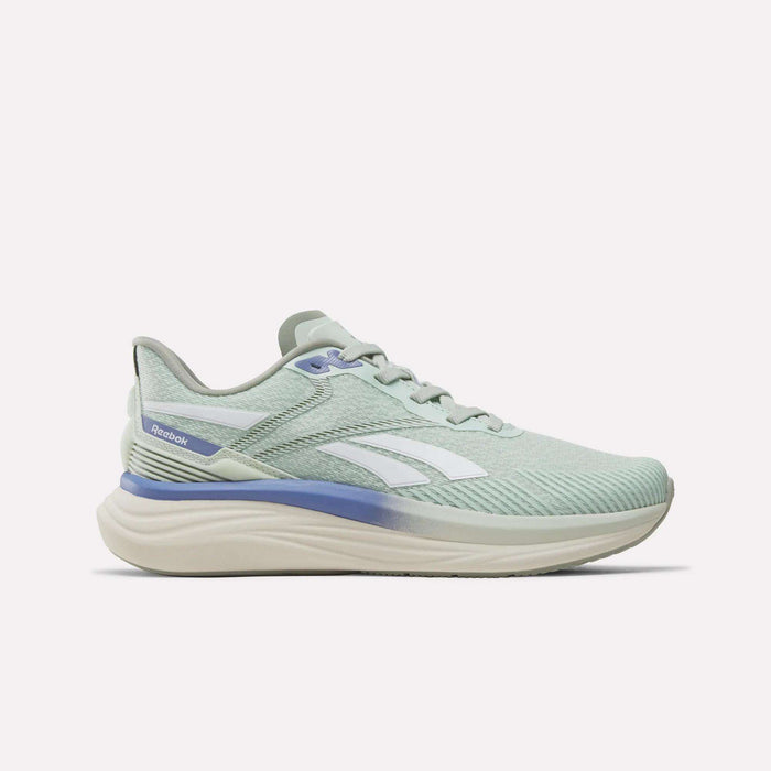 Dew-colored Women's Viva Speed Shoes by Reebok, featuring white stripes, hazy blue accents, a breathable mesh upper, and a thick cream sole with cushioned midsole—all shown in side profile on a plain white background.