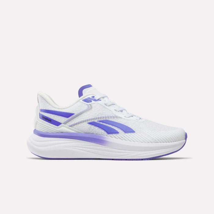 Introducing the Reebok Women's Viva Speed Shoes in White/Solar Purple/Black. Featuring a mesh upper for breathability, lace-up closure, and stylish solar purple accents with coordinating sole details, these athletic running shoes offer a cushioned design for all-day comfort. Displayed on a plain white background.