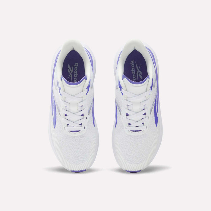 Top view of a pair of Reebok Women's Viva Speed Shoes featuring purple accents and Reebok logos on the insoles, placed side by side on a plain white background. These cushioned sneakers are crafted for comfort and style, making them perfect for active lifestyles.