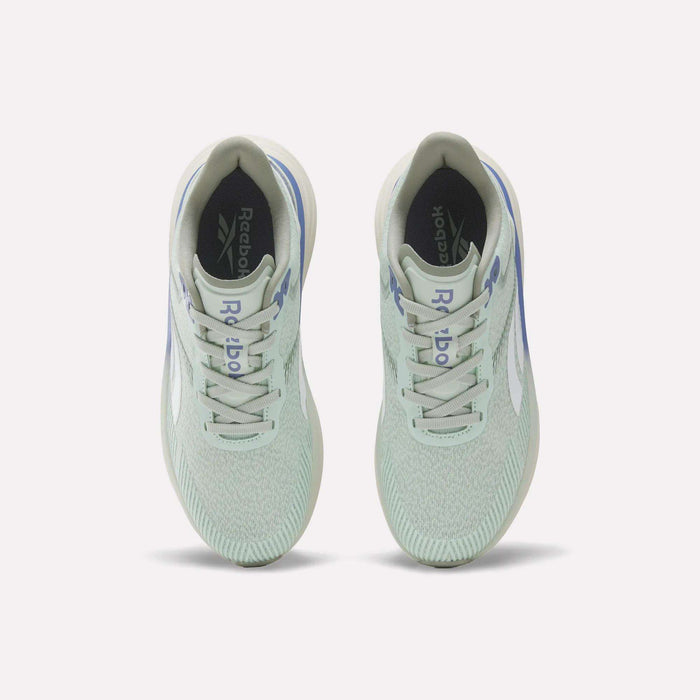 A top view of a pair of Women's Viva Speed Shoes by Reebok in mint green, featuring white soles and light blue accents, displayed on a plain light background. These breathable shoes are designed with a cushioned midsole for enhanced comfort and support.