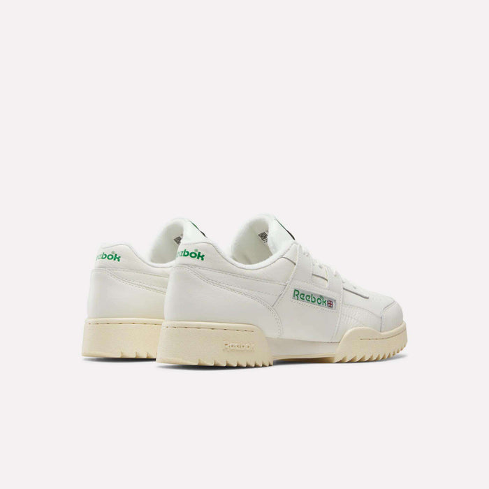 A pair of Reebok Workout Plus Ripple Shoes in vintage white, featuring green and blue logo details, displayed from a back and side angle on a plain white background.