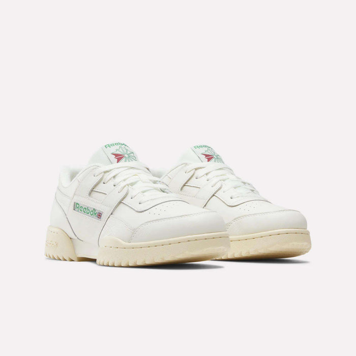 A pair of Reebok Workout Plus Ripple Shoes in off-white with beige soles, green and red logo accents, and a classic retro fitness design, displayed on a plain white background.