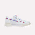The Women's Club C 85 Shoes by Reebok feature white leather, an off-white sole, blue and red accents, and the iconic Reebok logo with a Union Jack on the side. Shown in a side view against a plain light background.
