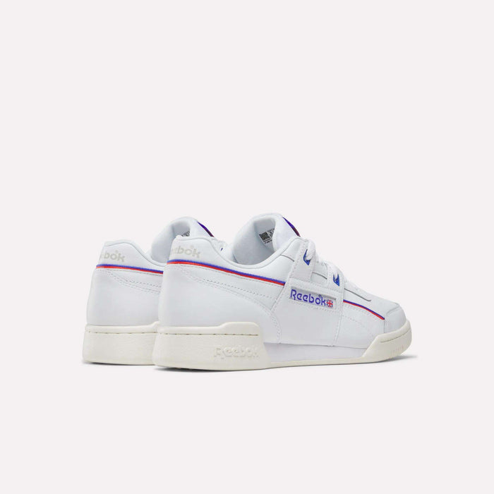 The Reebok Women's Club C 85 Shoes in white feature blue and red accents, shown from back and side angles on a simple background—an ideal choice for everyday women’s style.