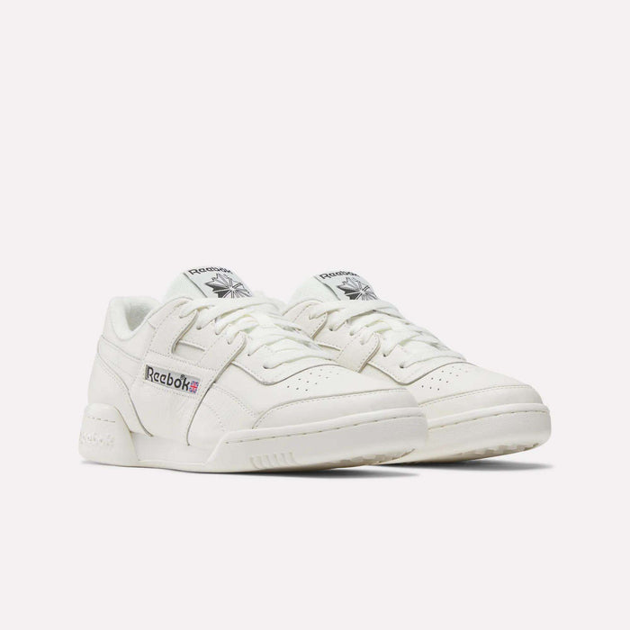 The Reebok Workout Plus Shoes are low-top sneakers in white, featuring the signature Reebok logo and Union Jack flag on the side, evoking classic '80s fitness style against a plain white background.
