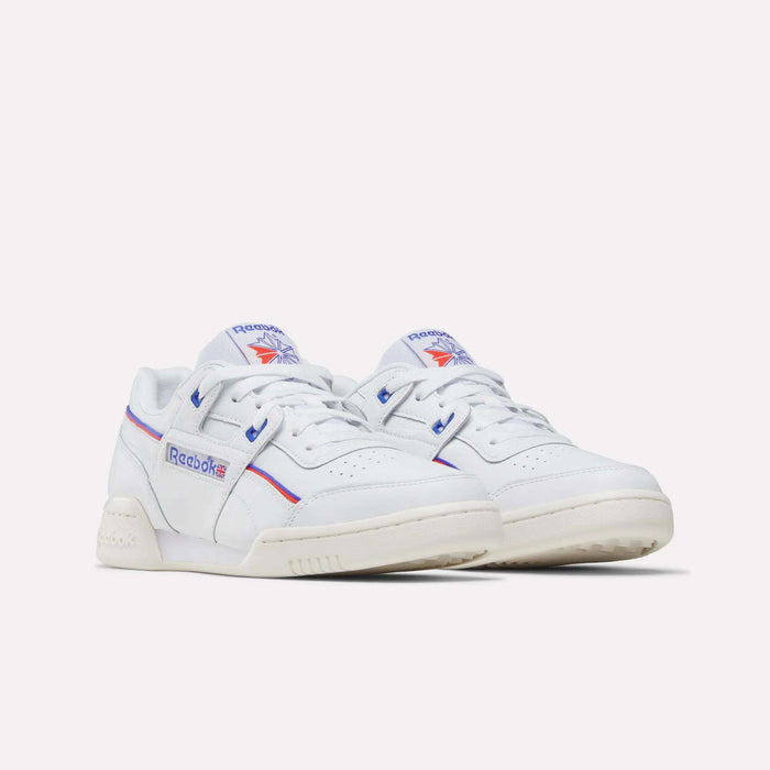 A pair of Reebok Women's Club C 85 Shoes in white leather with blue and red accents, featuring the Reebok logo on the sides and tongue, displayed against a plain white background—timeless style for any outfit.