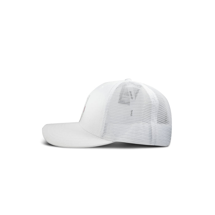 A side view of the Reebok Woven Patch Vector Trucker Cap on a white background, featuring a solid white front, mesh back panels, curved brim, and adjustable snapback closure.