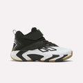 Drawing inspiration from classic boys’ Reebok basketball shoes, the Zone Breaker Shoes – Little Kids feature a mid-cut white and black design with detailed patterns, mesh texture, a chunky sole accented with gum tones and zigzag designs, plus an easy-to-use velcro strap.