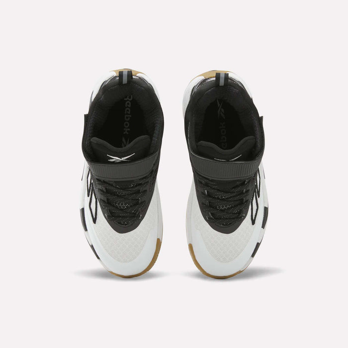 Top view of a pair of Reebok Zone Breaker Shoes for little kids, featuring black, white, and brown detailing with black laces and the Reebok logo visible on the black insoles. These basketball shoes have a mid-cut design and are positioned side by side on a white background.