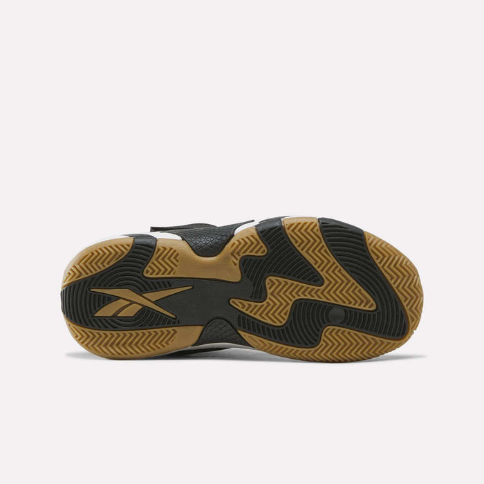 The image shows the sole of the Reebok Zone Breaker Shoes for little kids, featuring a black and gum rubber pattern with a wavy design and a visible Reebok logo.